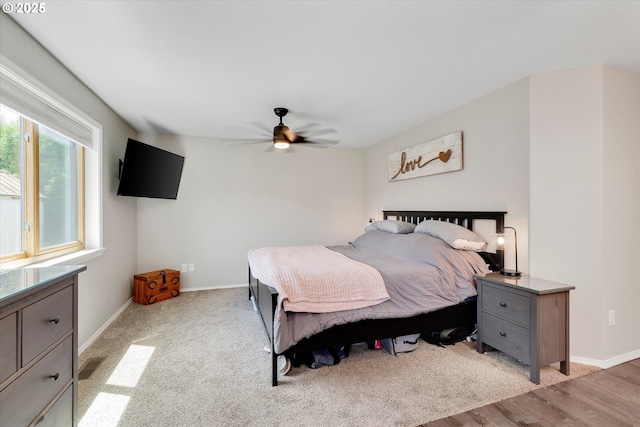 625 SE 7th Pl, Canby, OR 97013 - bedroom with baseboards, ceiling fan, and light wood finished floors