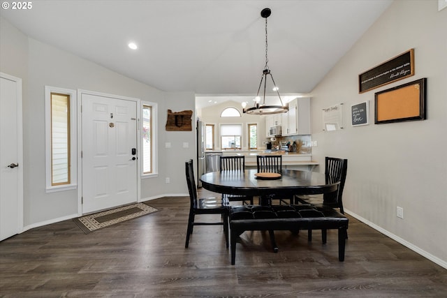 625 SE 7th Pl, Canby, OR 97013 - dining room featuring vaulted ceiling, a chandelier, dark wood-type flooring, recessed lighting, and baseboards
