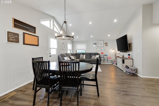 625 SE 7th Pl, Canby, OR 97013 - dining space with a chandelier, dark wood-type flooring, high vaulted ceiling, baseboards, and recessed lighting