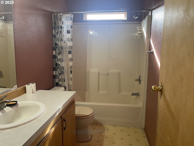 full bathroom with vanity, toilet, and shower / bath combo