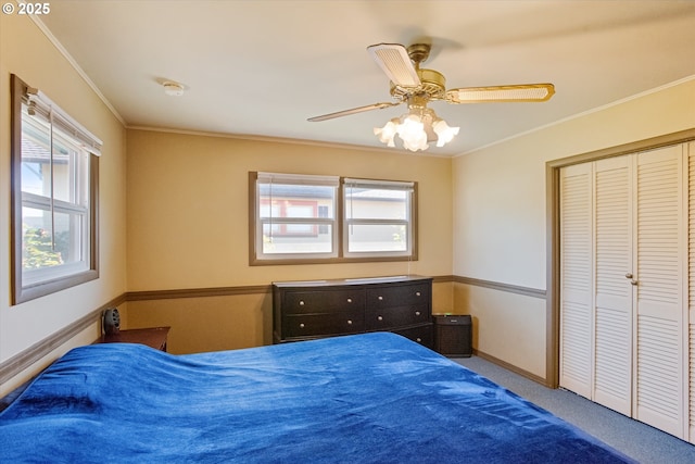 208 E 3rd St, Molalla, OR 97038 - bedroom with multiple windows, crown molding, a closet, ceiling fan, and carpet floors