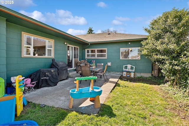 208 E 3rd St, Molalla, OR 97038 - rear view of house with a patio area and a lawn