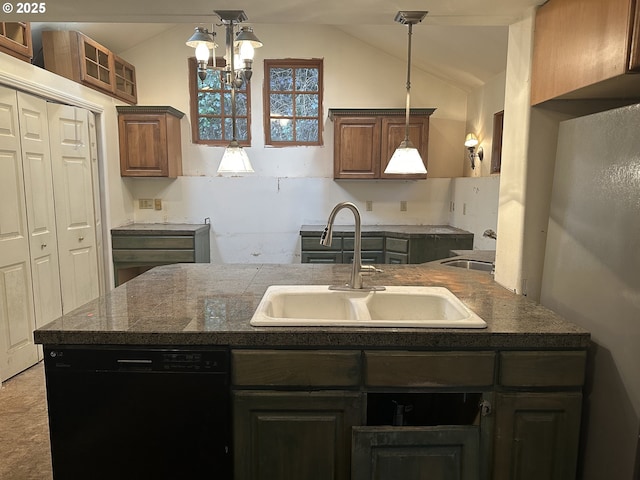 kitchen with black dishwasher, vaulted ceiling, a sink, and decorative light fixtures