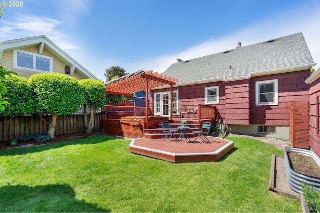 rear view of house with a pergola, a deck, and roof with shingles