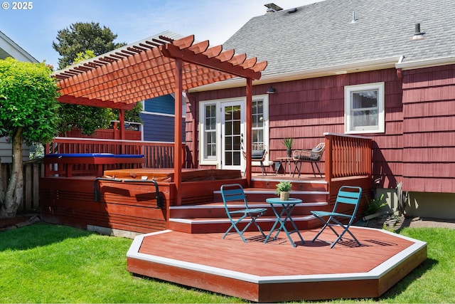 wooden deck featuring a pergola and a hot tub