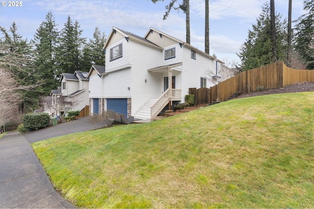 exterior space with a garage and a front yard