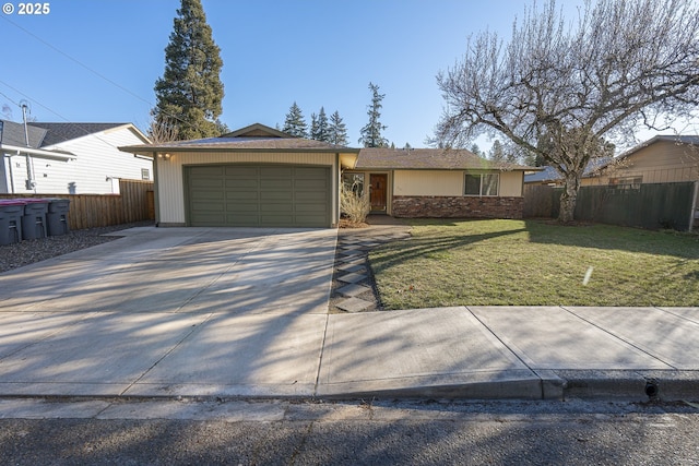 single story home with a garage and a front lawn