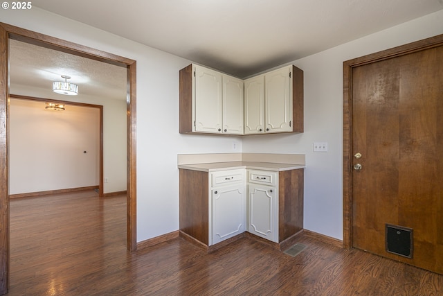 kitchen featuring dark hardwood / wood-style floors