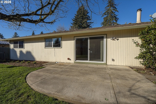 back of property with a patio area