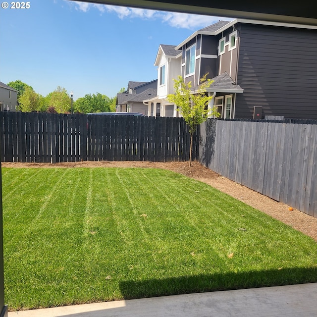 view of yard with fence