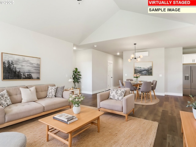 living room with high vaulted ceiling, a notable chandelier, dark wood finished floors, and baseboards