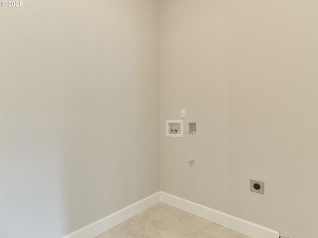 laundry room with laundry area, hookup for an electric dryer, baseboards, and hookup for a washing machine