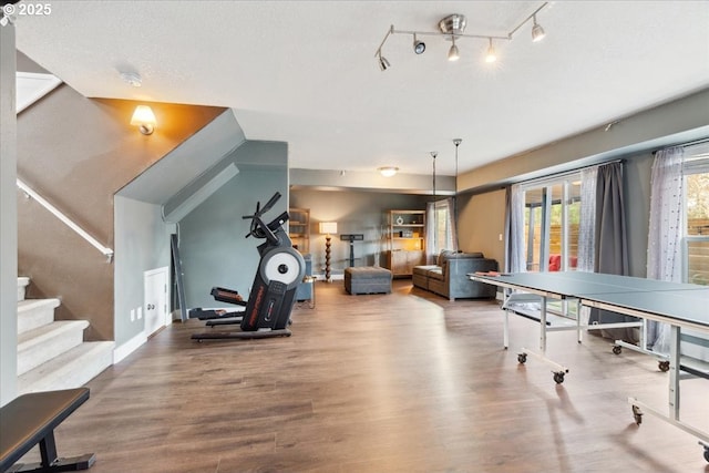 recreation room featuring wood finished floors