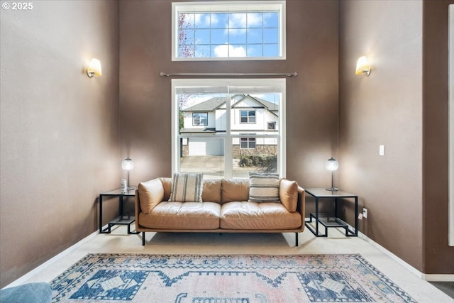 sitting room featuring baseboards