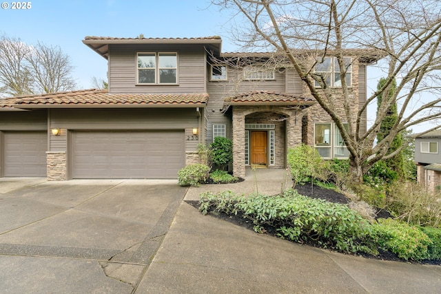 view of front of property with a garage