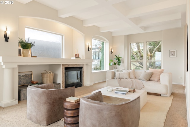 living room featuring beamed ceiling, coffered ceiling, and light carpet