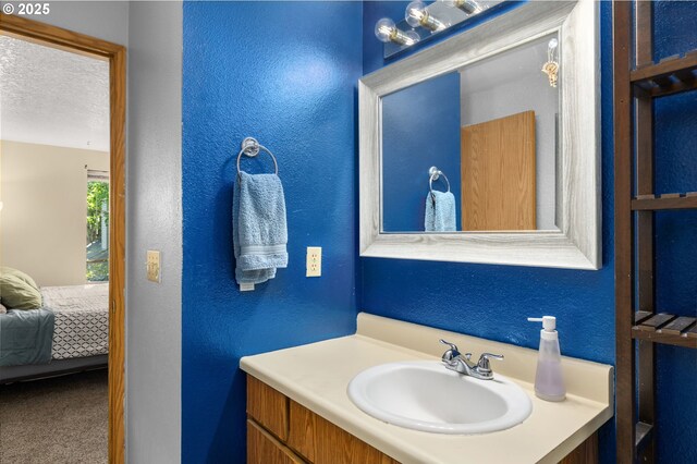 6160 SW Alice Ln Unit 203B, Beaverton, OR 97008 - carpeted bedroom with a textured ceiling and a closet