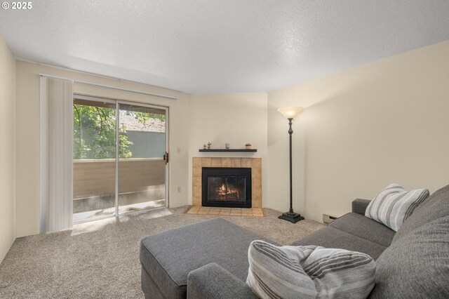 6160 SW Alice Ln Unit 203B, Beaverton, OR 97008 - carpeted living room featuring a fireplace