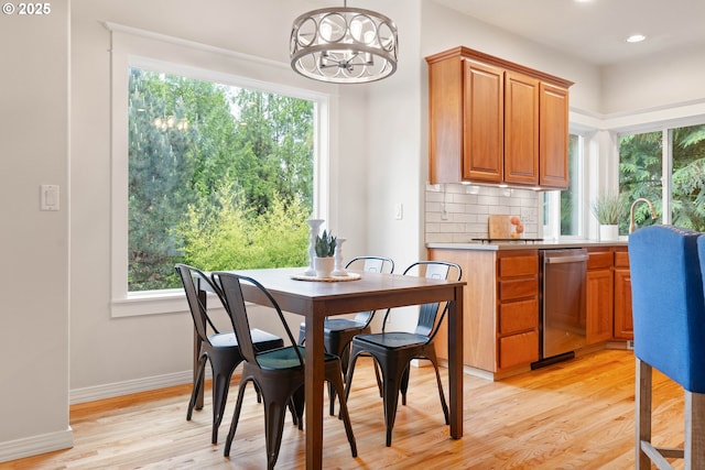 10540 SW Lancaster Rd, Portland, OR 97219 - dining room with a chandelier, light wood-style floors, plenty of natural light, baseboards, and recessed lighting