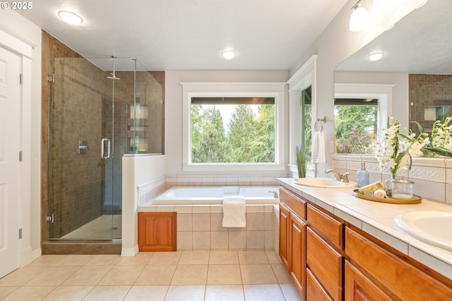 10540 SW Lancaster Rd, Portland, OR 97219 - bathroom with tile patterned floors, a stall shower, a bath, and double vanity