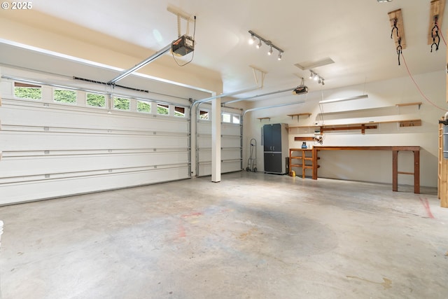 10540 SW Lancaster Rd, Portland, OR 97219 - garage featuring a garage door opener