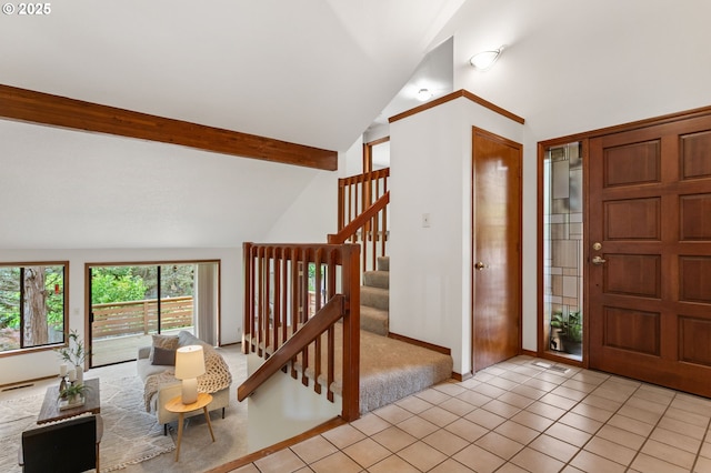 10315 SW 28th Ave, Portland, OR 97219 - entryway featuring light tile patterned floors, high vaulted ceiling, stairway, beamed ceiling, and baseboards