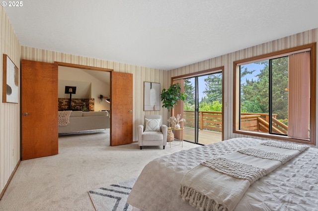 10315 SW 28th Ave, Portland, OR 97219 - bedroom featuring carpet floors, wallpapered walls, and access to outside