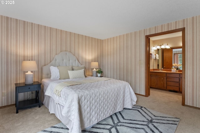 10315 SW 28th Ave, Portland, OR 97219 - bedroom featuring wallpapered walls, light colored carpet, baseboards, and connected bathroom