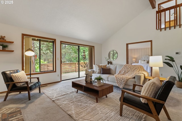 10315 SW 28th Ave, Portland, OR 97219 - living room with high vaulted ceiling, light colored carpet, baseboards, and beam ceiling
