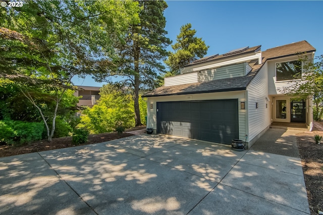 view of property exterior featuring a garage