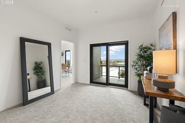 2417 E 6th St, Vancouver, WA 98661 - doorway to outside with visible vents, baseboards, and carpet