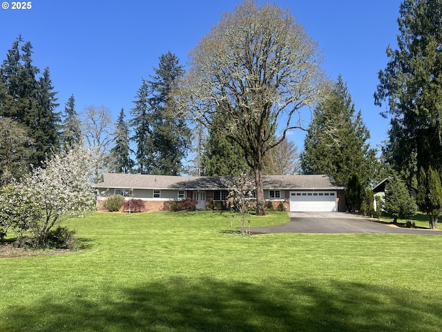 5608 NE Salmon Creek St, Vancouver, WA 98686 - ranch-style home with an attached garage, a front lawn, and aphalt driveway