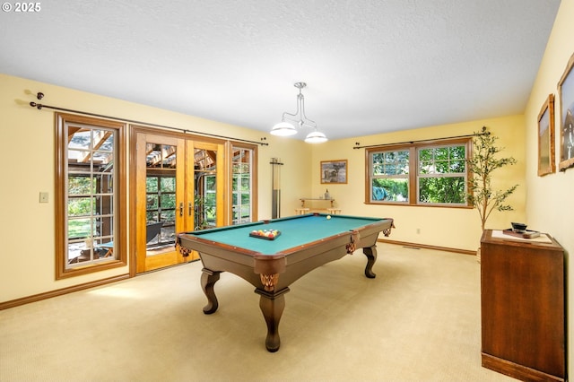 recreation room with baseboards, pool table, light colored carpet, and french doors