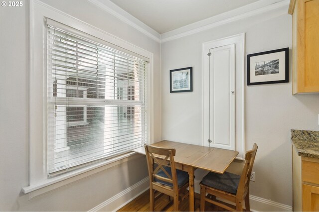 1509 NE 10th Ave Unit 105, Portland, OR 97232 - dining room with ornamental molding and wood finished floors