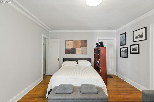 1509 NE 10th Ave Unit 105, Portland, OR 97232 - bedroom featuring wood finished floors and crown molding