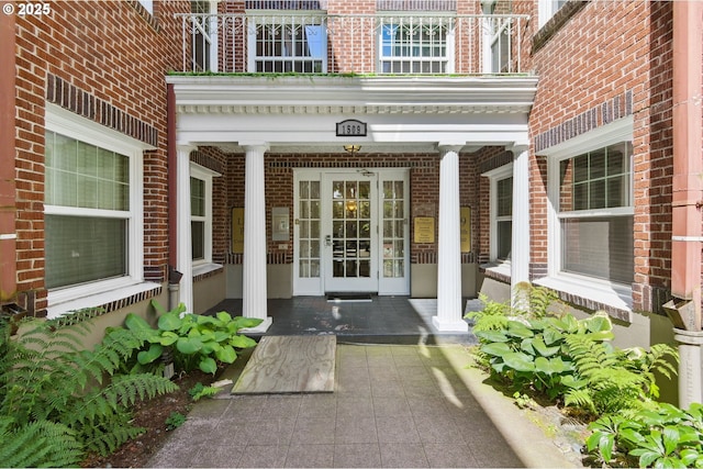 1509 NE 10th Ave Unit 105, Portland, OR 97232 - view of exterior entry with a porch and brick siding