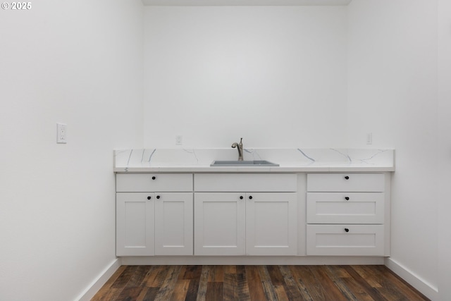 bathroom with vanity and wood-type flooring