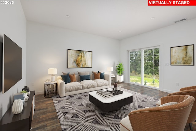 living room with dark hardwood / wood-style flooring