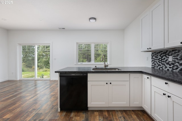 kitchen with white cabinetry, sink, backsplash, and black dishwasher