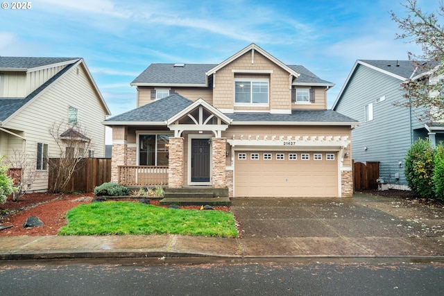 craftsman inspired home featuring a garage