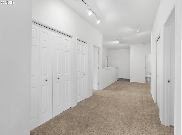 2689 Cupola Dr, Eugene, OR 97403 - hall featuring track lighting and light colored carpet
