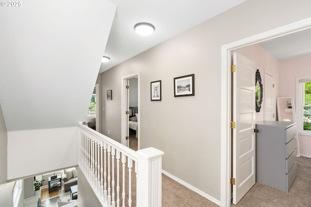 17 S Curry St, Portland, OR 97239 - hall featuring an upstairs landing, light carpet, and baseboards