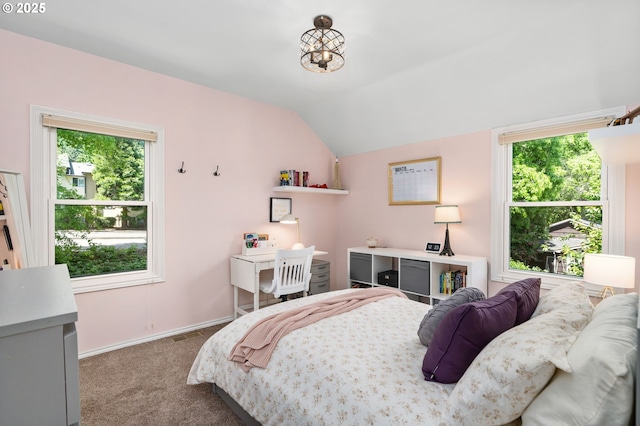 17 S Curry St, Portland, OR 97239 - bedroom with lofted ceiling, carpet floors, and baseboards