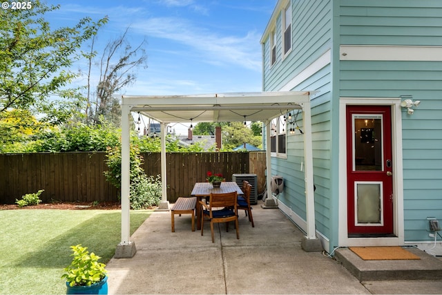 17 S Curry St, Portland, OR 97239 - view of patio with outdoor dining space and central AC