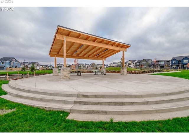 surrounding community with a patio and a gazebo