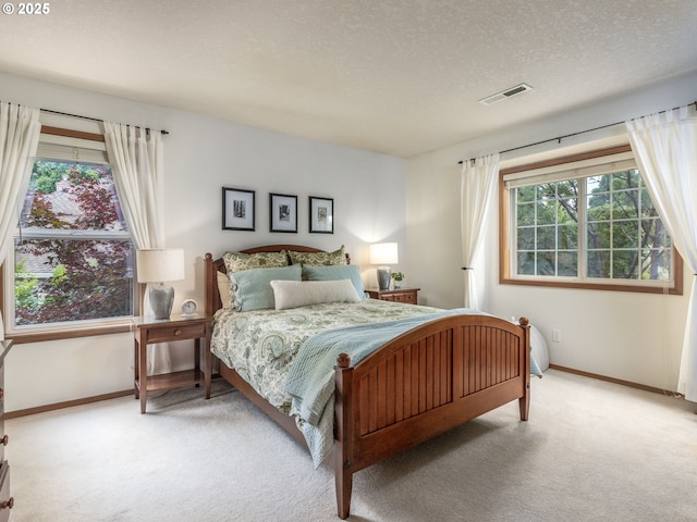 29643 SW Young Way, Wilsonville, OR 97070 - carpeted bedroom featuring baseboards and a textured ceiling
