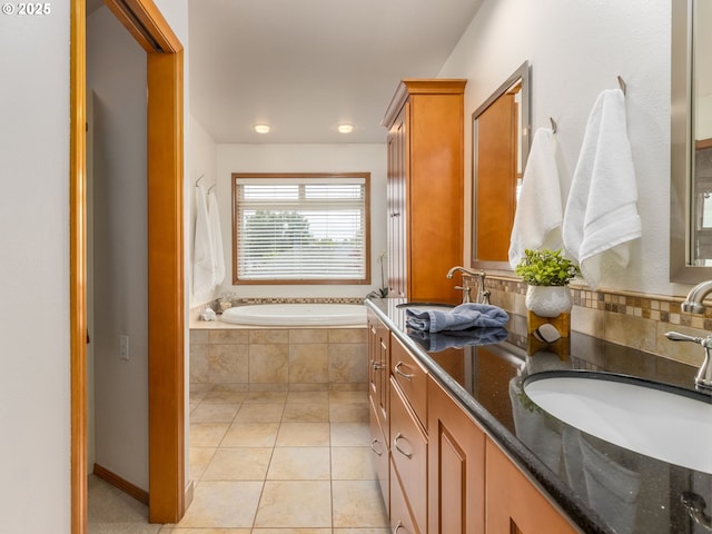 29643 SW Young Way, Wilsonville, OR 97070 - bathroom with a garden tub, double vanity, tile patterned floors, and recessed lighting