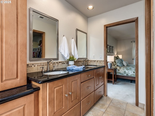 29643 SW Young Way, Wilsonville, OR 97070 - ensuite bathroom with double vanity, tile patterned floors, and recessed lighting
