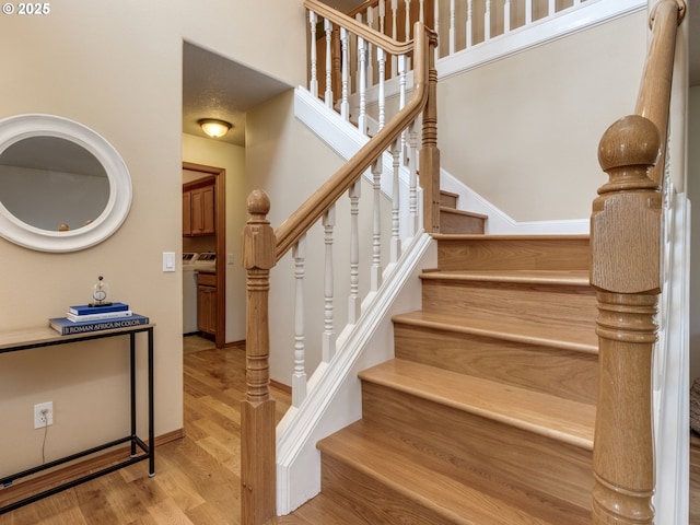 29643 SW Young Way, Wilsonville, OR 97070 - stairs featuring wood finished floors and a towering ceiling