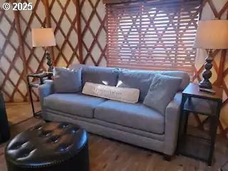 sitting room with wood finished floors